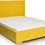 Żółte, duże, nowoczesne łóżko